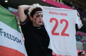 An Iranian soccer fan protests at a World Cup game in Qatar - source: Reuters